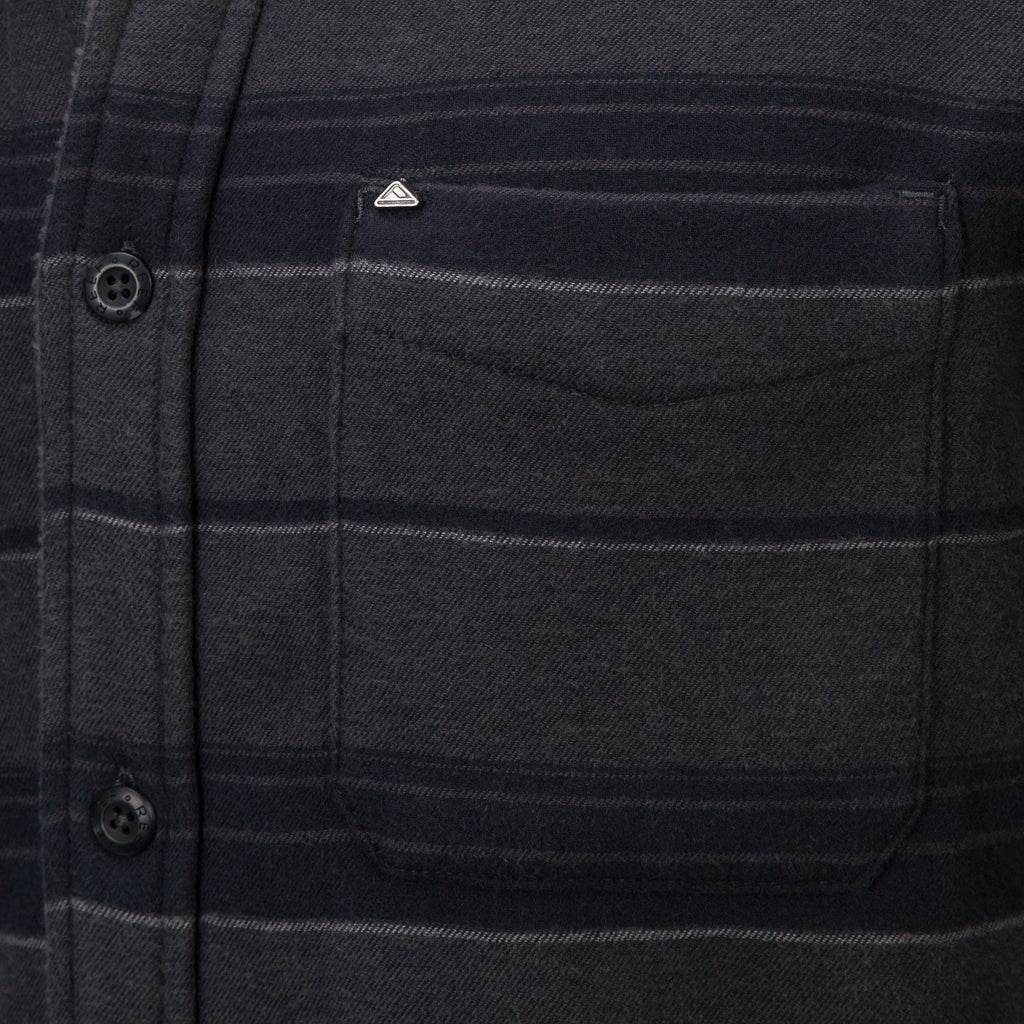 Close-up of the chest pocket on the Bartlett Woven Jacket, featuring soft, durable, beach-inspired apparel fabric.