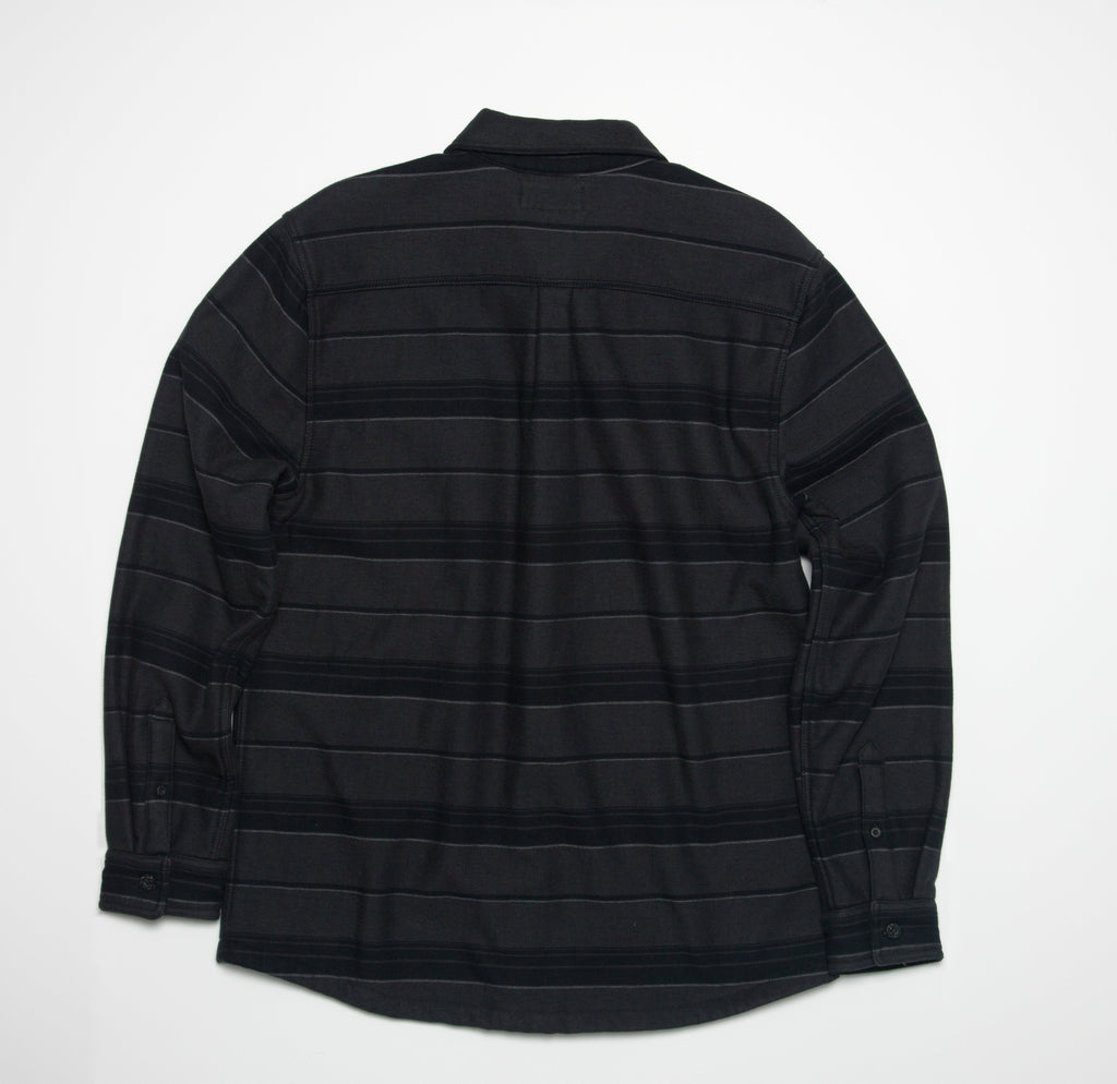 Bartlett Woven Jacket back view showing textured black striped beach-inspired comfort apparel with long sleeves and collar