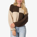 Front view of the Carrie Sweater showing ribbed knit texture in brown and beige blocks, highlighting comfort and beach-inspired style.