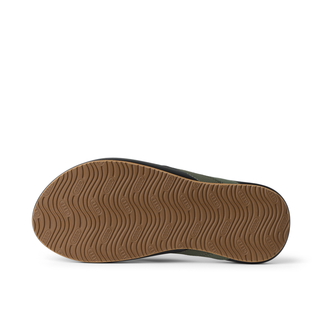Cushion Phantom 2.0 showing the outsole facing up with durable, water-friendly tread for all-day beach comfort.