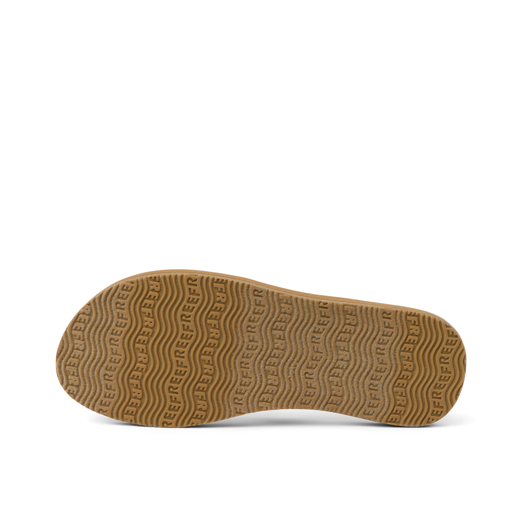 Baja Maria women's shoe sole facing up, showing durable, water-friendly tread with REEF branding for beach comfort.