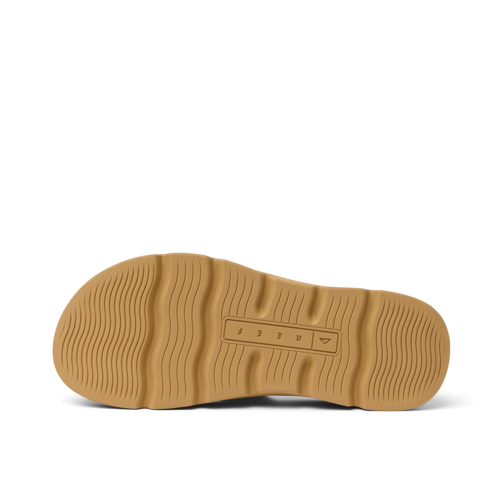 Vista Luxe Thea women's sandal sole facing up, showing textured, durable, water-friendly outsole with REEF branding.
