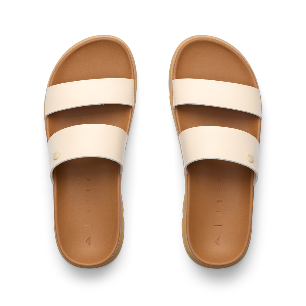 Vista Luxe Thea women's sandals facing upward with two cream straps, cushioned footbed, and anatomical arch support.
