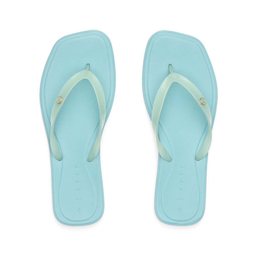 Solaye women's mint teal flip flops top view, beach-inspired comfort with anatomical arch support and soft cushioning.