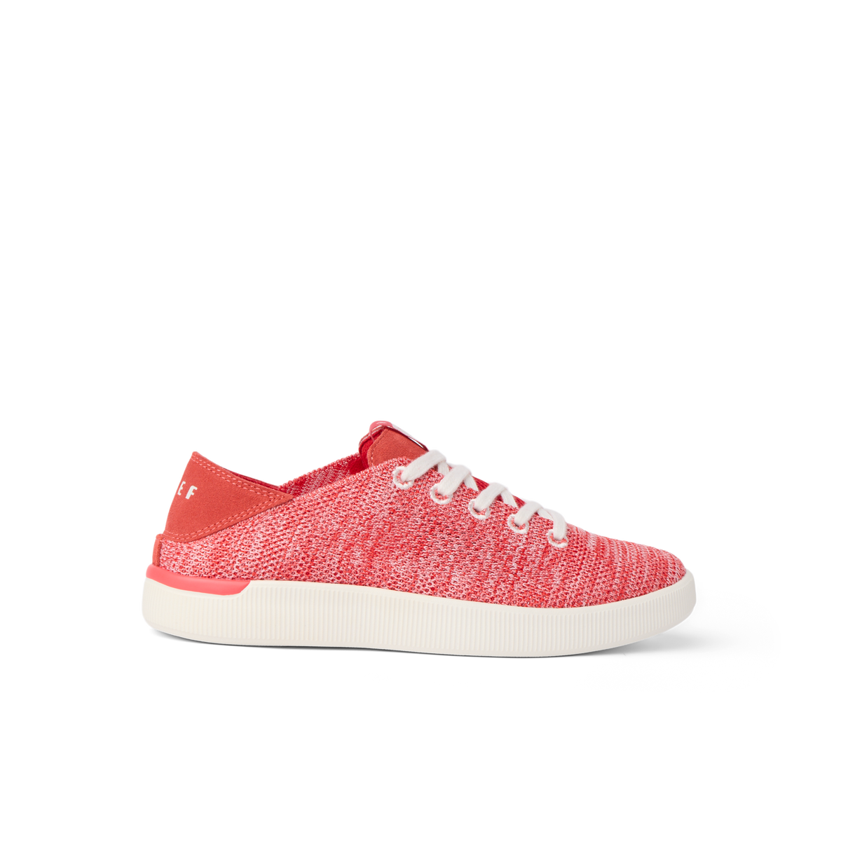 Reef Neptune women's coral knit sneaker facing right, featuring lightweight design and anatomical arch support for all-day comfort.