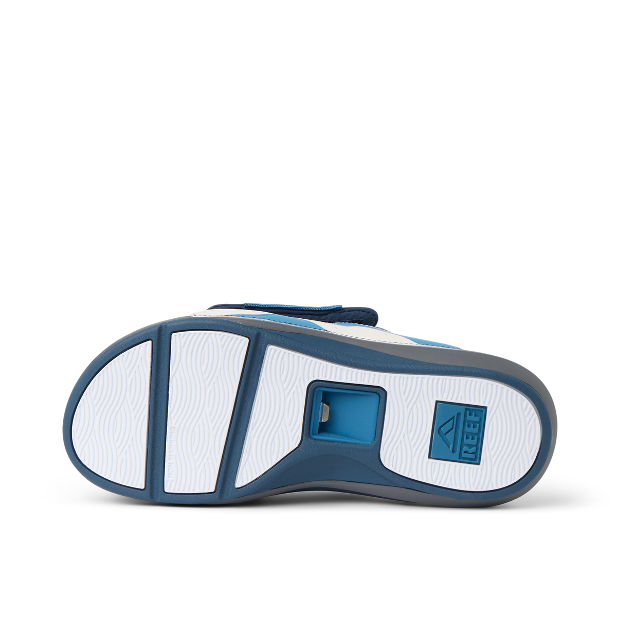 Cruiser Slide men's footwear showing the navy and grey sole facing upward with surf-inspired design and cushioning.