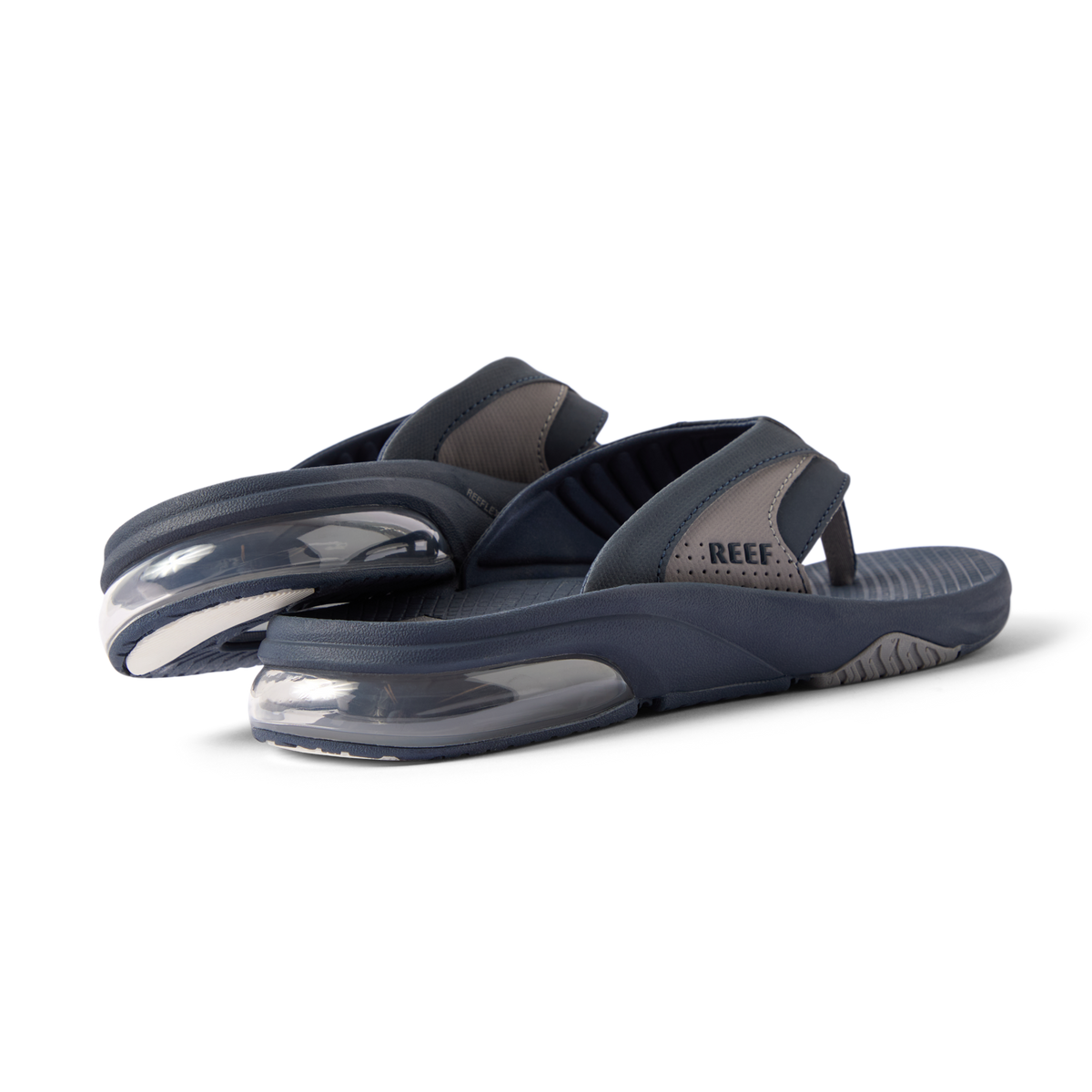 Pair of men's Fanning + sandals facing left showing back and sole with cushioned heel and water-friendly materials