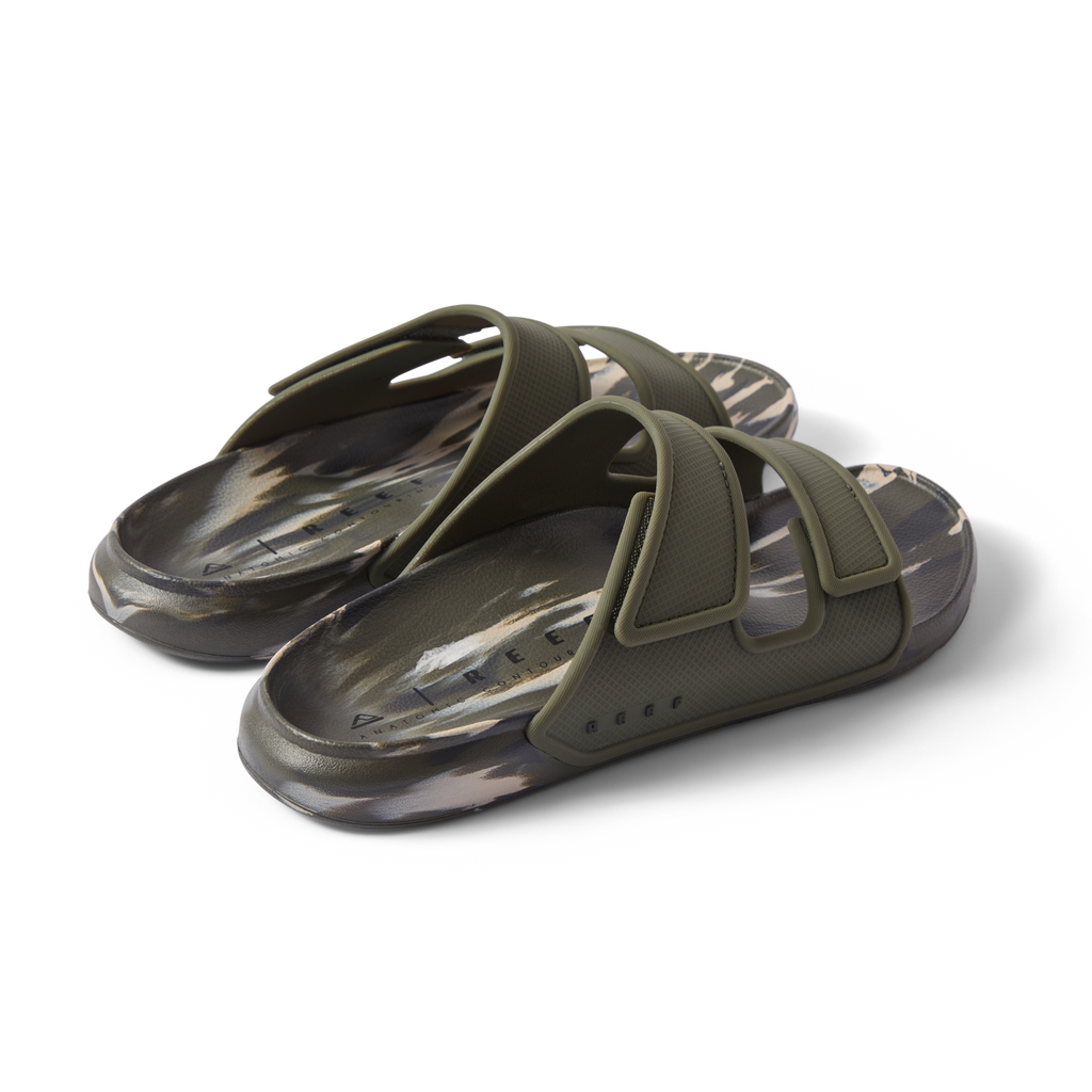 Oasis Adapt men's sandals facing right, close-up of top and side straps in camo marble pattern, comfort-focused design.