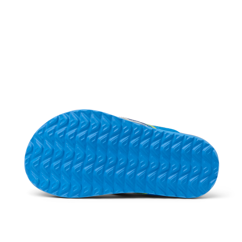 Little Windswell showing the blue textured sole of a boys' flip flop, surf-inspired comfort and durability design.