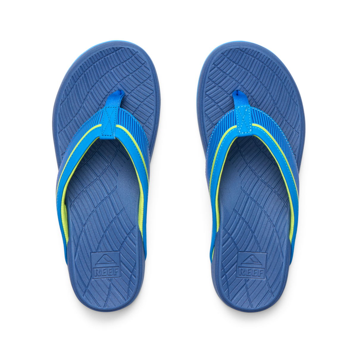 Top view of Kids Windswell blue and volt boys flip flops with anatomical arch support and soft cushioning for beach comfort