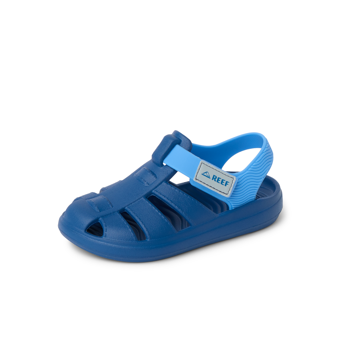 Little Totally Beachin sandal for boys facing left, close-up on blue water-friendly shoe with arch support and cushioning.