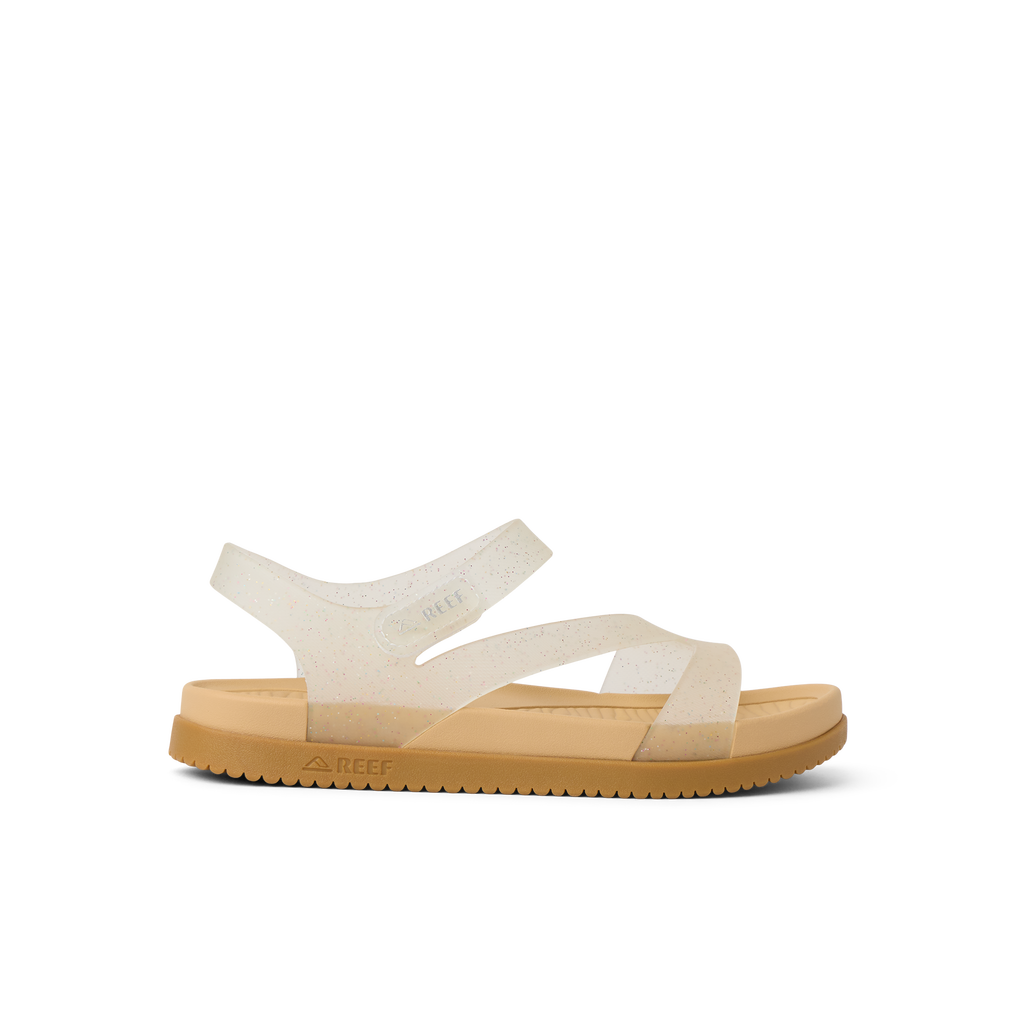 Kids Cali Coastin girls' glitter confetti sandal facing right, showing side with arch support and cushioned sole