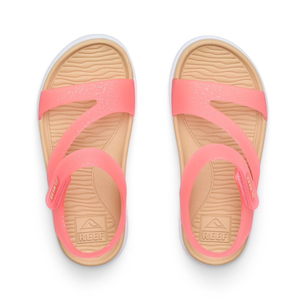 Little Cali Coastin girls’ sandals top view, pink with glitter straps, featuring comfort and arch support for littles.