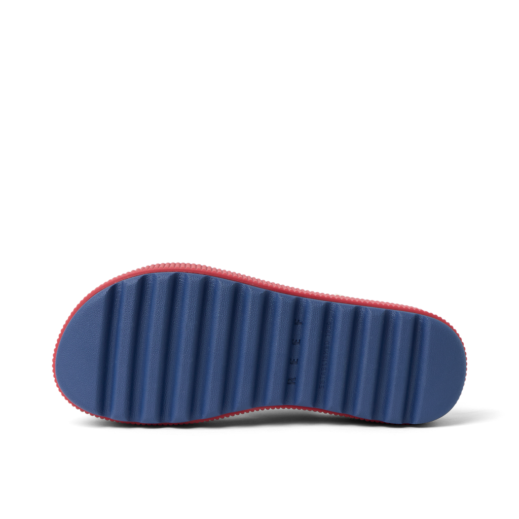 Water Vista Higher women’s footwear showing the blue sole facing up, surf-inspired comfort with arch support and cushioning.