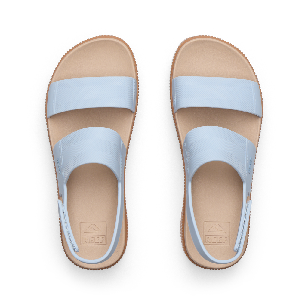 Top view of women's Water Vista Higher sandals in pale blue and sand with arch support and cushioned footbeds.