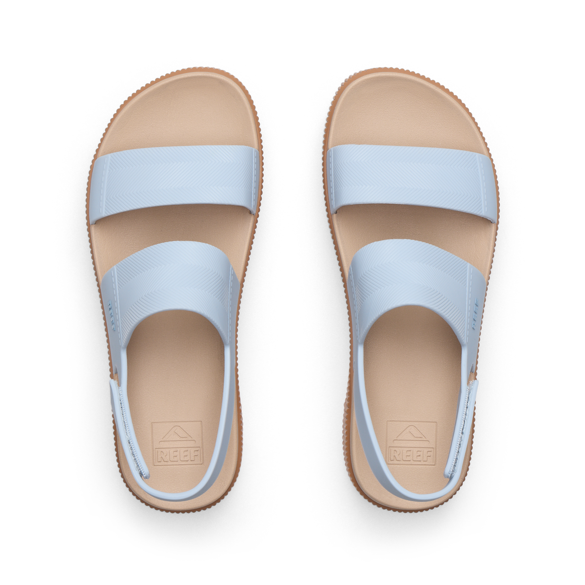 Top view of women's Water Vista Higher sandals in pale blue and sand with arch support and cushioned footbeds.