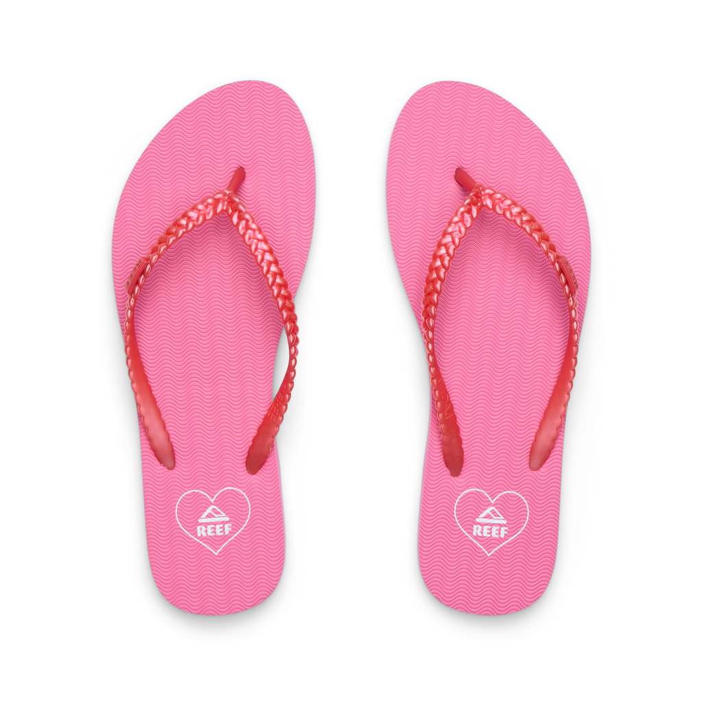 Top view of Seaside Twist pink women’s sandals with braided straps, featuring REEF comfort arch support and soft cushioning.
