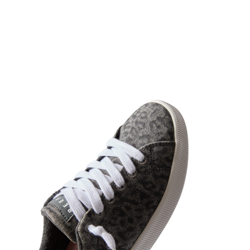 Close-up of the front and side of the Neptune Alana sneaker in denim cheetah, featuring soft-rebound cushioning and arch support.