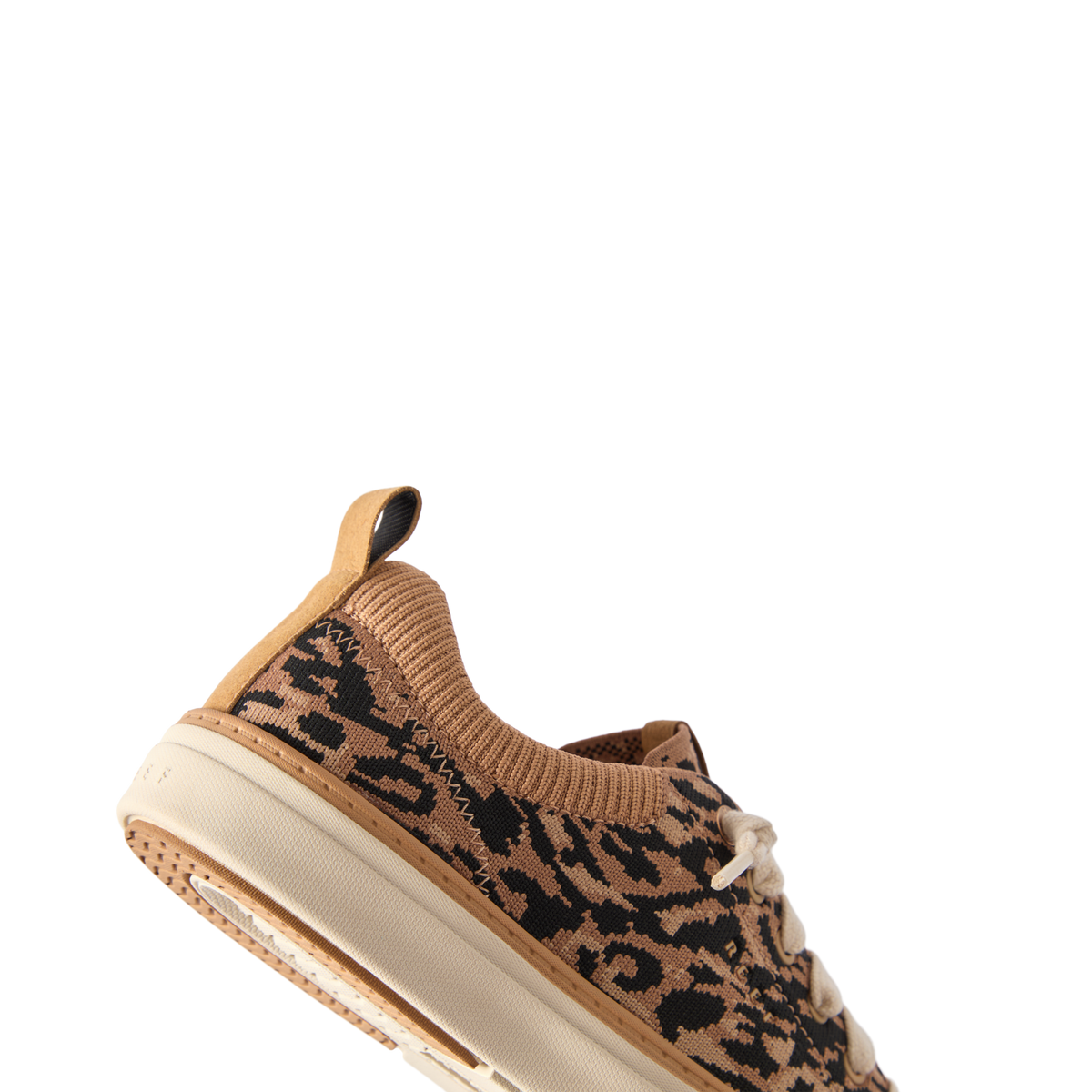 Lay Day Lite women's shoe facing left, close-up of knit upper with leopard pattern, showcasing cushioning and arch support design.