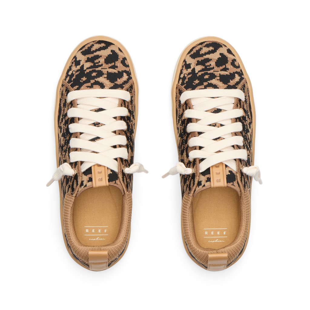 Top view of women's Lay Day Lite sneakers with leopard print, white laces, and cushioned insoles for comfort.