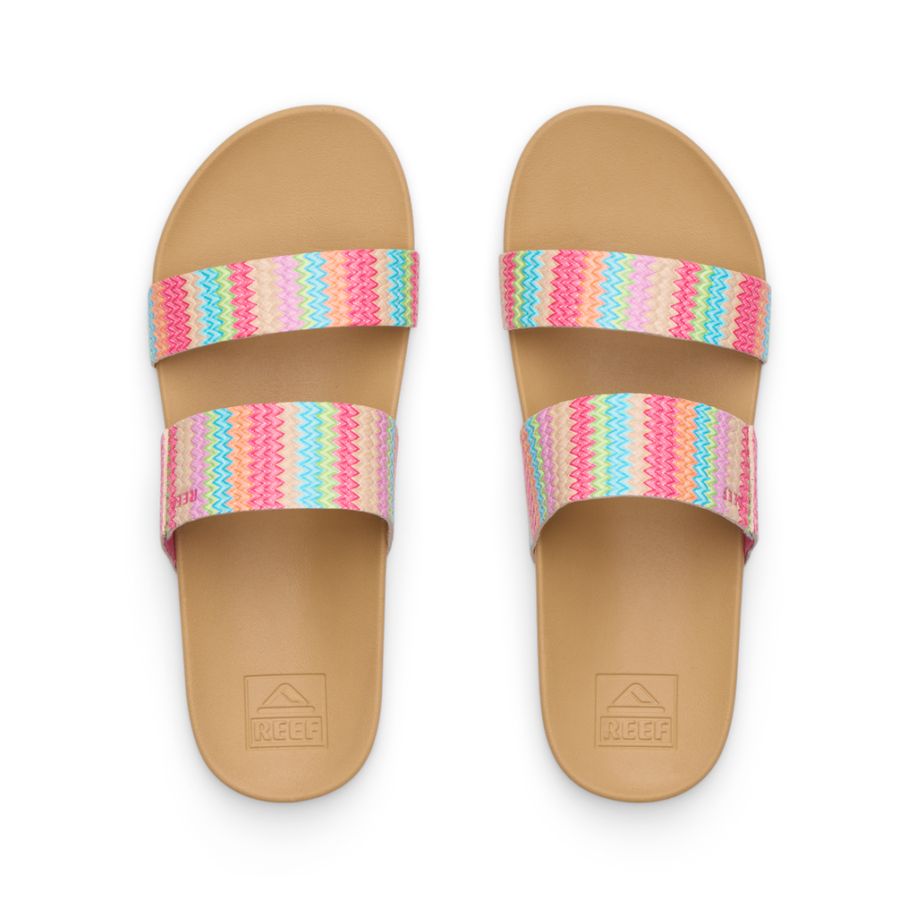 Top view of pair of Kids Cushion Vista sandals for girls with pink multi-color straps and cushioned footbed facing upward.