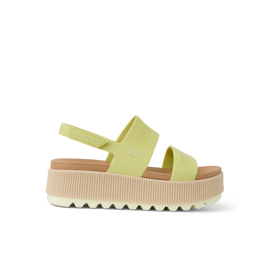 Water Vista Higher women's sandal facing left, lime sherbert color with thick cushioned platform sole for beach comfort.
