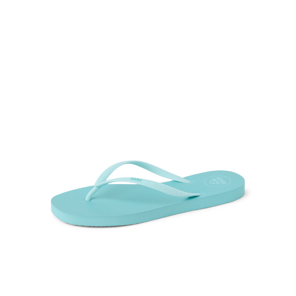 Seaside Square Toe women's aqua haze flip flop facing right, close-up of front footbed and straps with cushioned sole.