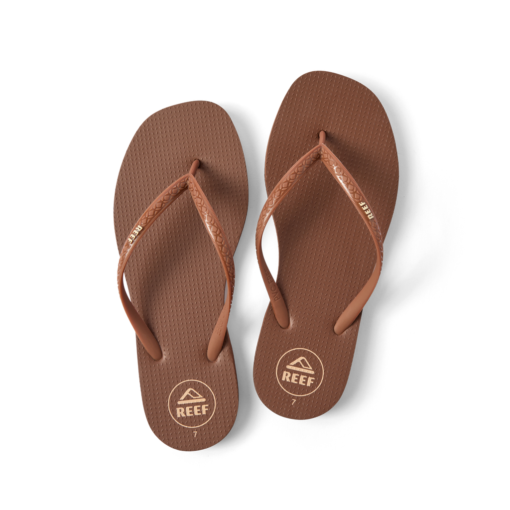 Seaside Square Toe brown flip flops facing upward, showing soft cushioning and water-friendly, durable straps.