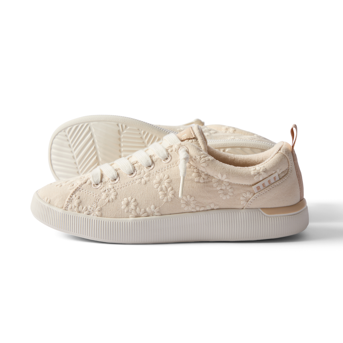 Side view of the left Neptune Alana sneaker for women with floral embroidery and enhanced arch support.