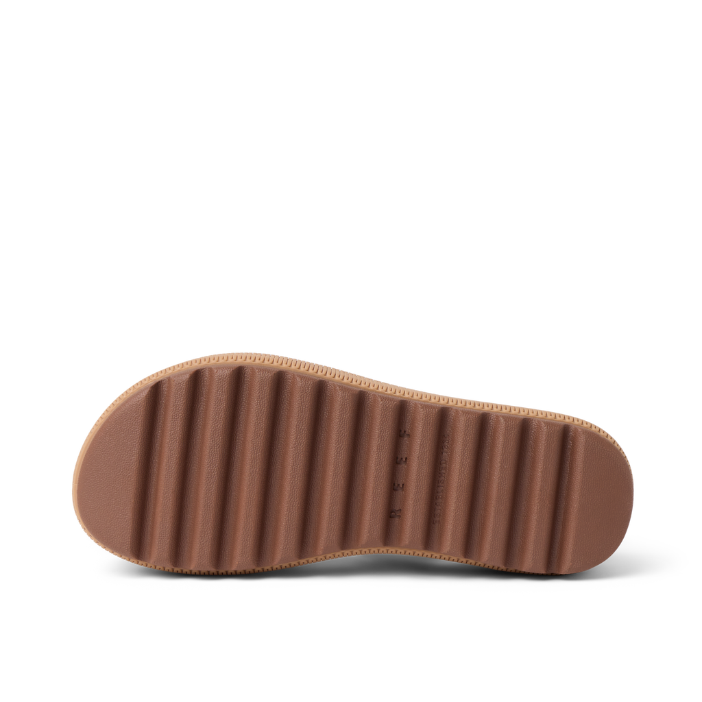 Water Vista Higher 2 showing the sole facing up, highlighting durable ridged outsole for beach and everyday comfort.