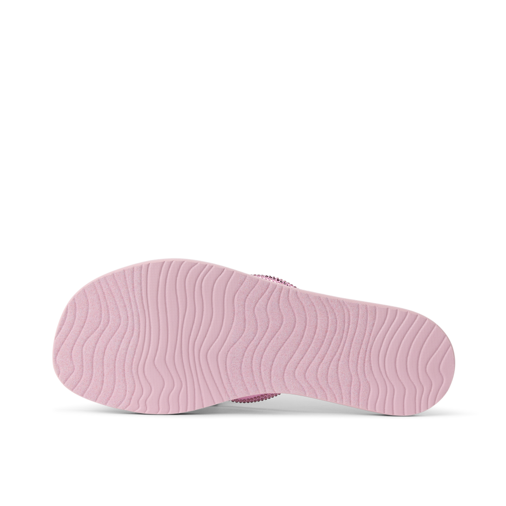 Bliss Bling Fling women's right sandal sole facing up in sunset pink with durable, water-friendly, cushioned design.