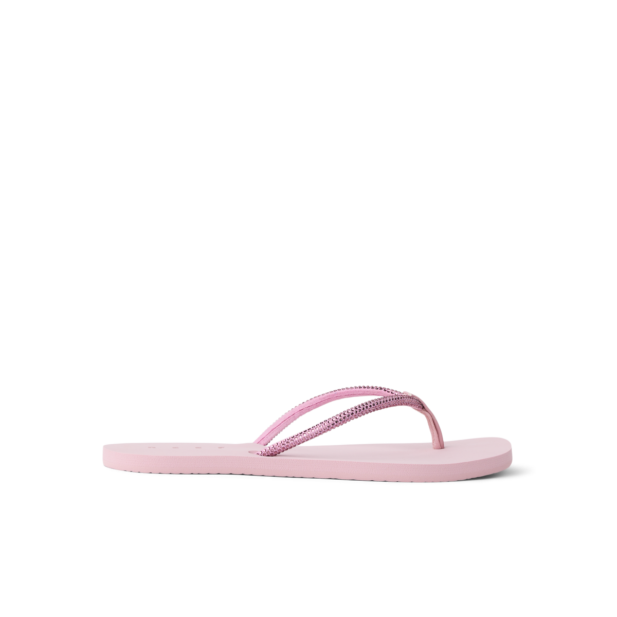 Bliss Bling Fling women's pink flip flop facing right, close-up of cushioned sole and textured straps for beach comfort