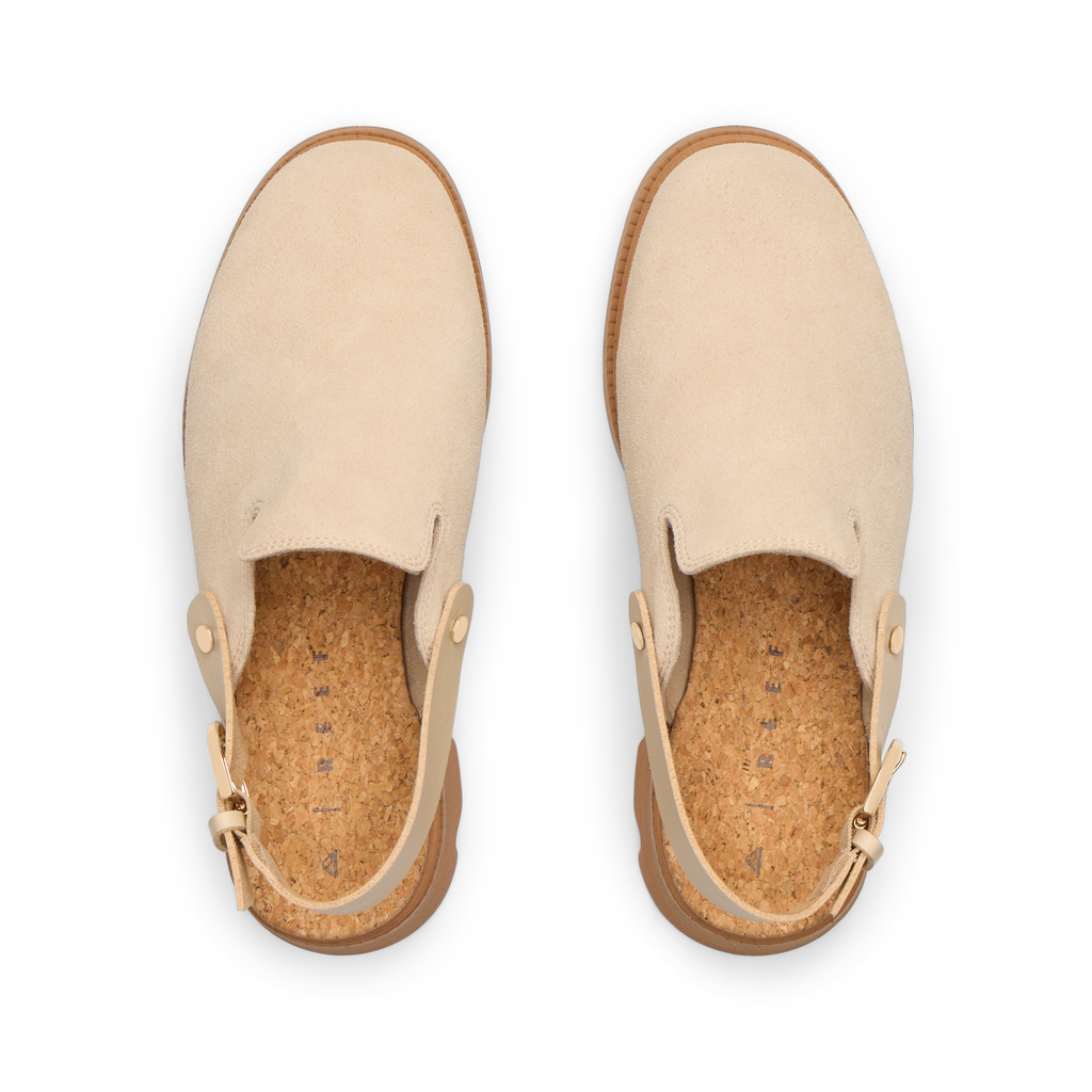 Vista Luxe Solene platform clogs facing upwards, showing soft suede upper and cork footbed for surf-inspired comfort.