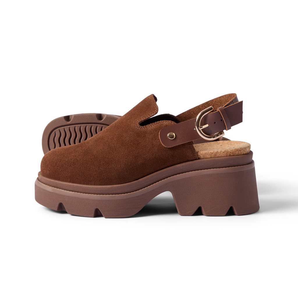 Vista Luxe Solene clog facing right, close-up of brown suede upper, platform sole, and adjustable buckle strap, beach-inspired comfort.