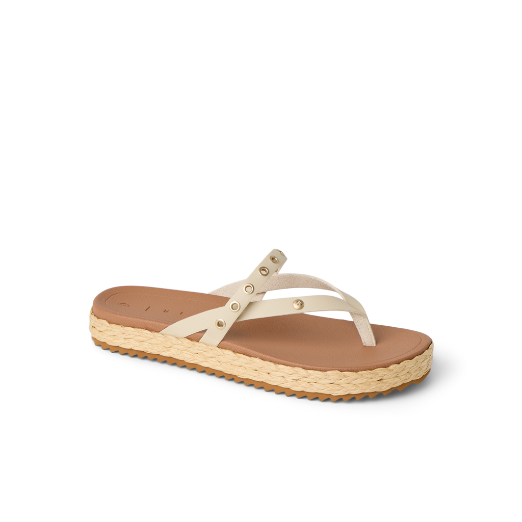 Vista Carmen women's sandal facing right, beige straps with rivets, cushioned footbed and textured sole, beach-inspired comfort.