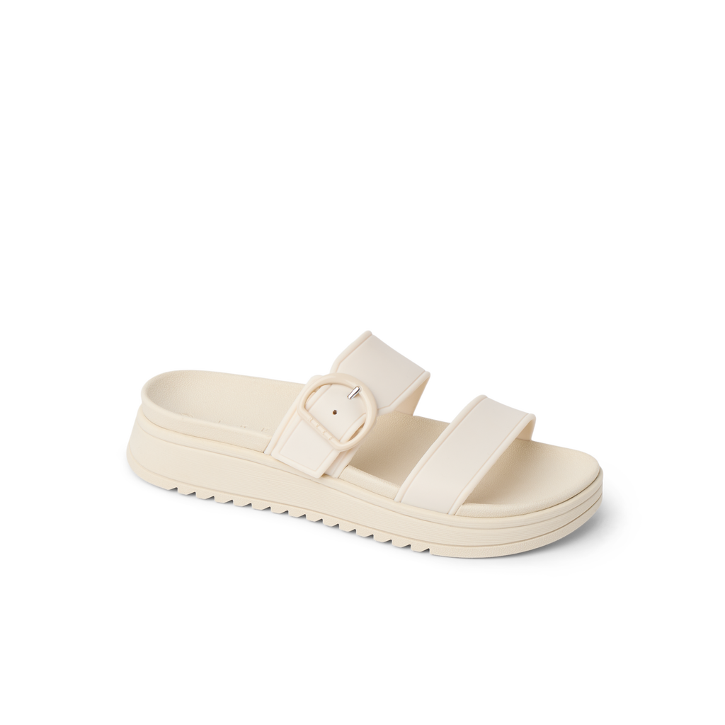 Vista Capri women's sandal facing right, close-up of cushioned footbed and buckle strap, beach-inspired comfort footwear.