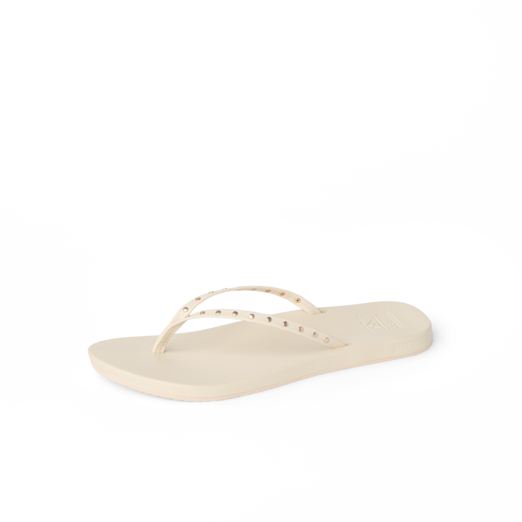 Cushion Slim Studs women's sandal facing left, featuring soft-rebound cushioning and studded straps for beach comfort.