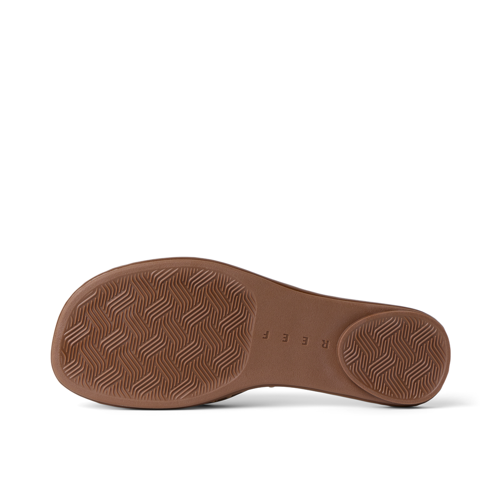 Willow Quinn Studs showing brown sole bottom facing upward, highlighting durable, water-friendly surf-inspired design.