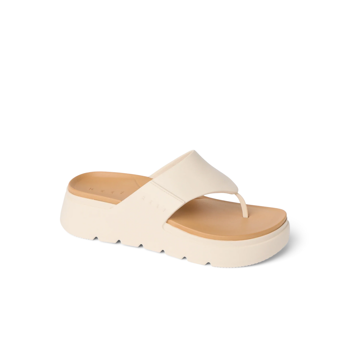 Cali Laguna sandal facing right, close-up of platform sole and cushioned toe post in white, beach-inspired comfort design