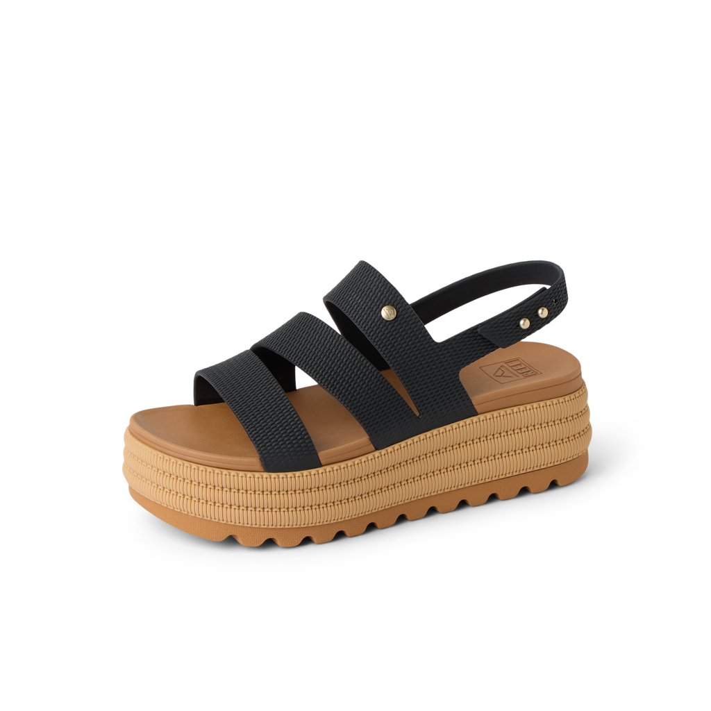 Water Vista Higher 2 women's sandal facing left with black straps and tan platform, showing cushioned arch support and outsole.