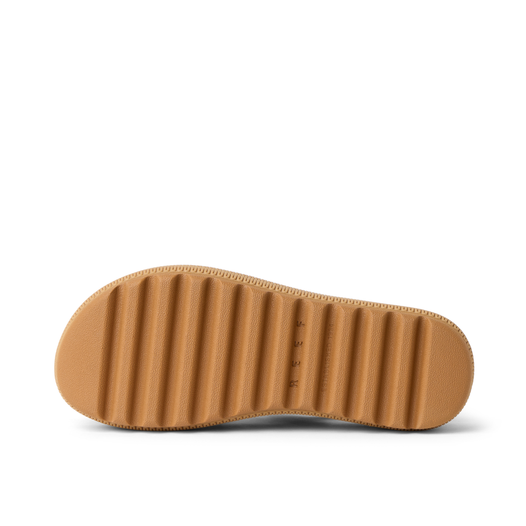 Water Vista Higher 2 showing the sole facing up with textured grip and comfort features for beach and active lifestyles.