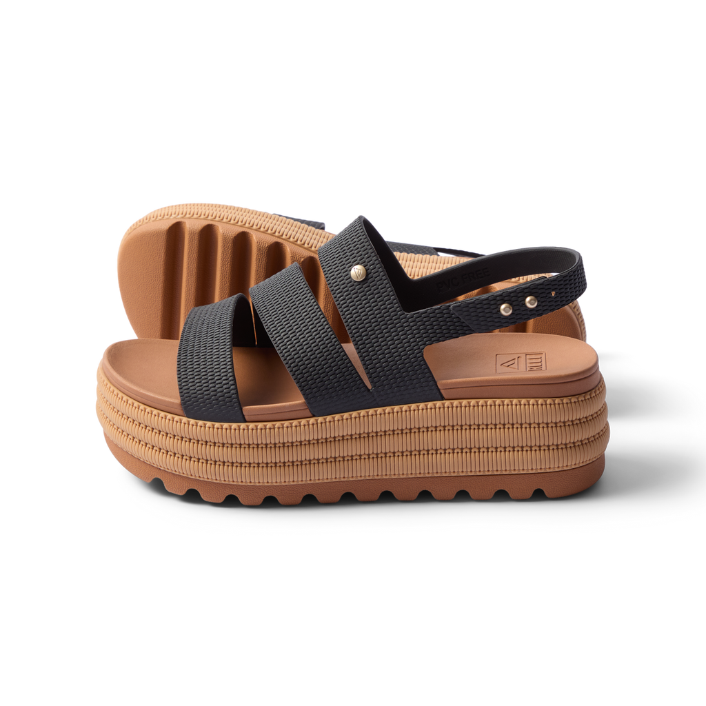 Water Vista Higher 2 women's black and tan platform sandal facing right, showcasing cushioned sole and water-friendly straps.