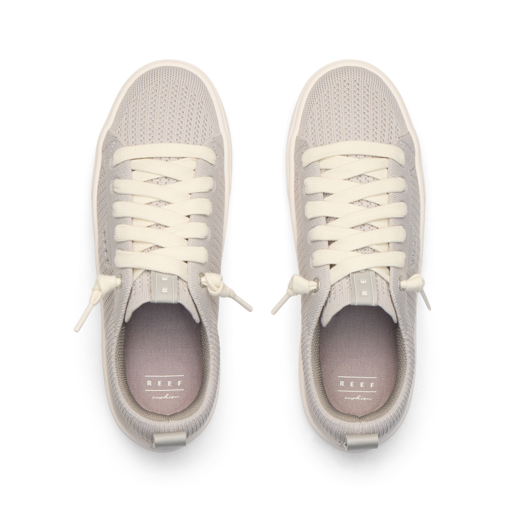 Top view of light gray Lay Day Lite women's sneakers featuring breathable mesh and soft cushioning for beach comfort.