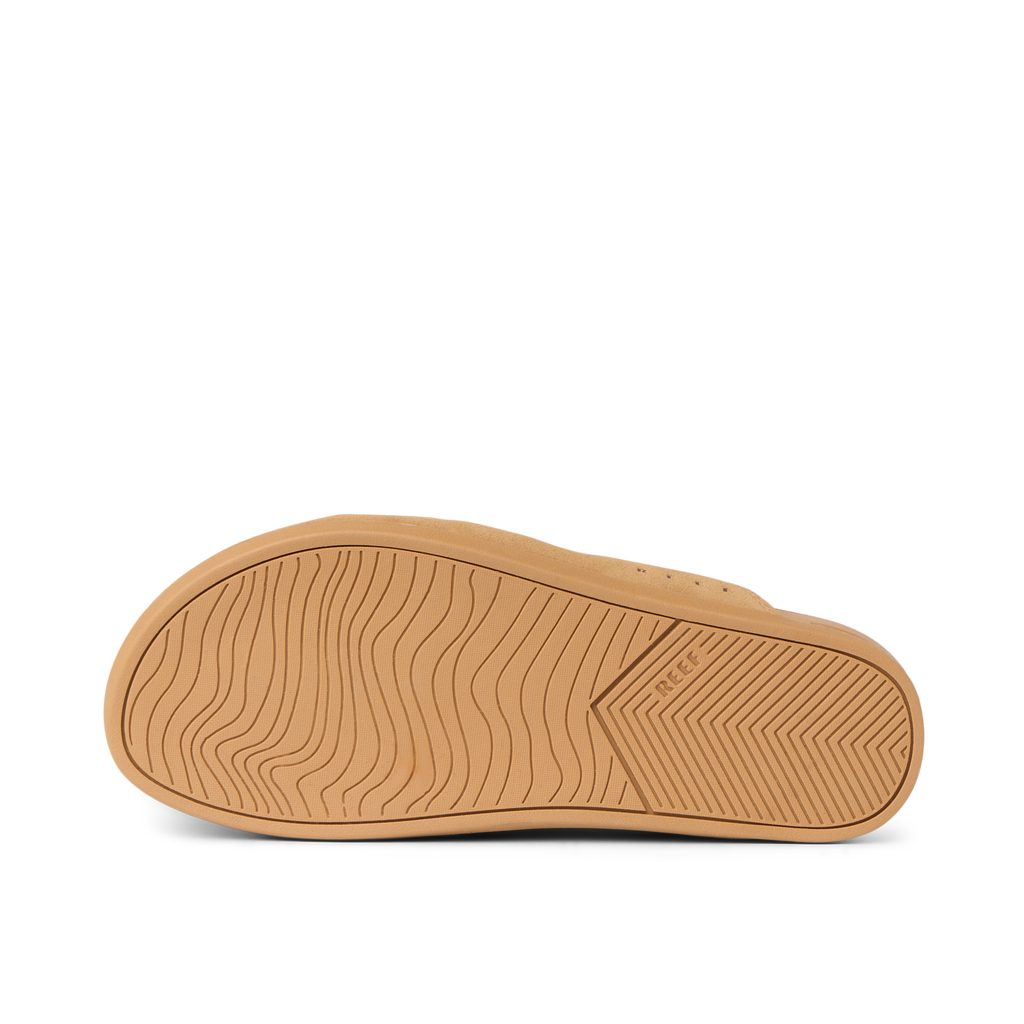 Sole view of the Vista Myra in tan suede, women's clog with durable rubber outsole featuring wave-inspired grip pattern.