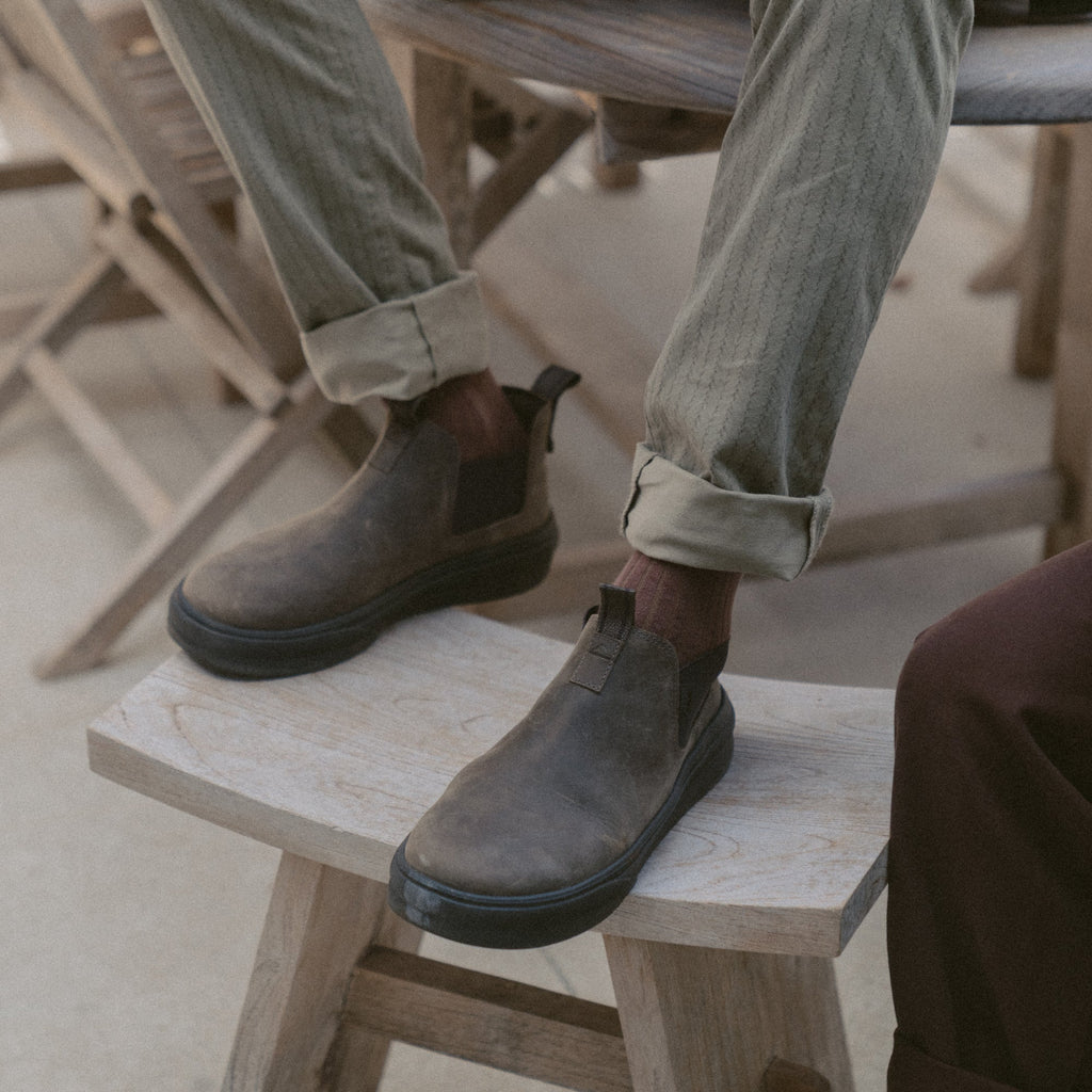 Evo mid-cut leather-look shoes facing left, showcasing cushioned comfort and everyday style