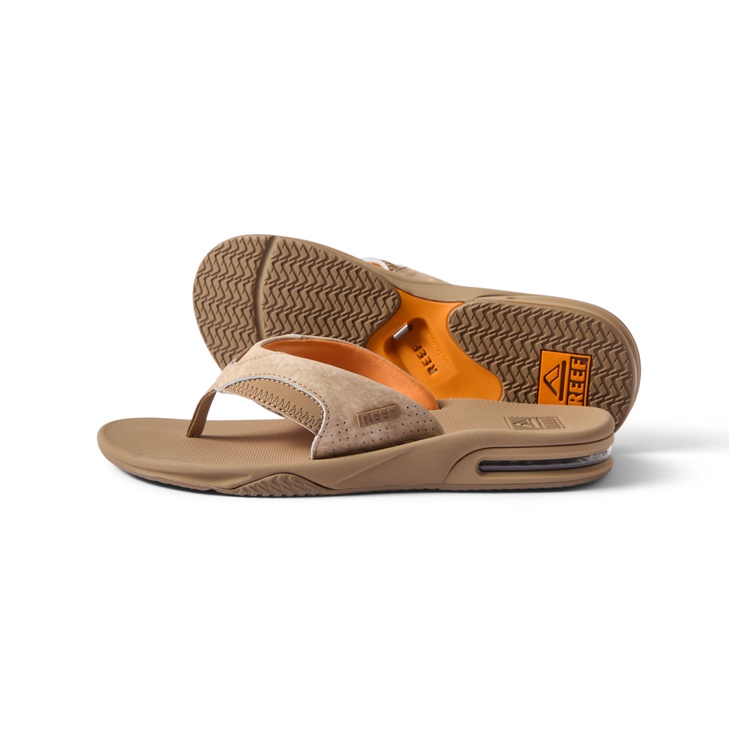 Fanning men's tan flip flop sandals showing top and bottom, facing right, with arch support and soft cushioning for comfort.