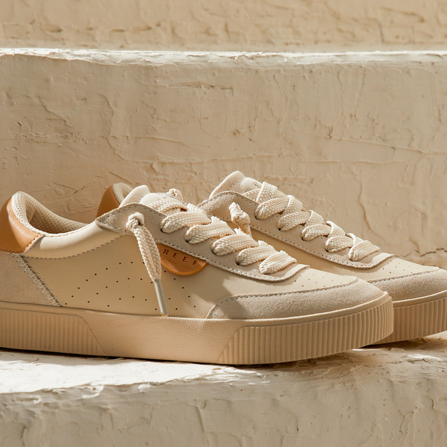 Close-up of Lay Day Seas sneakers facing right, featuring water-friendly materials and anatomical arch support.
