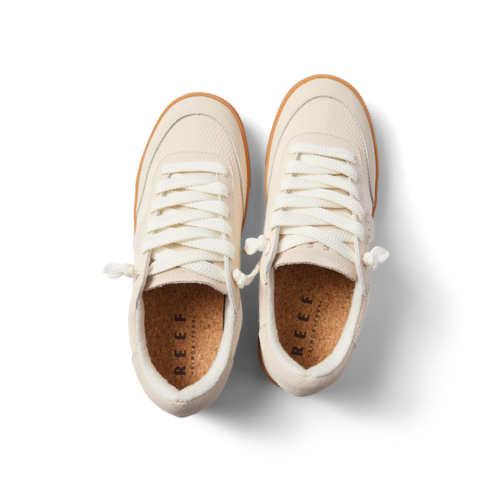 Top view of Lay Day Seas women's sneakers in vintage white, featuring water-friendly materials and cushioned comfort.