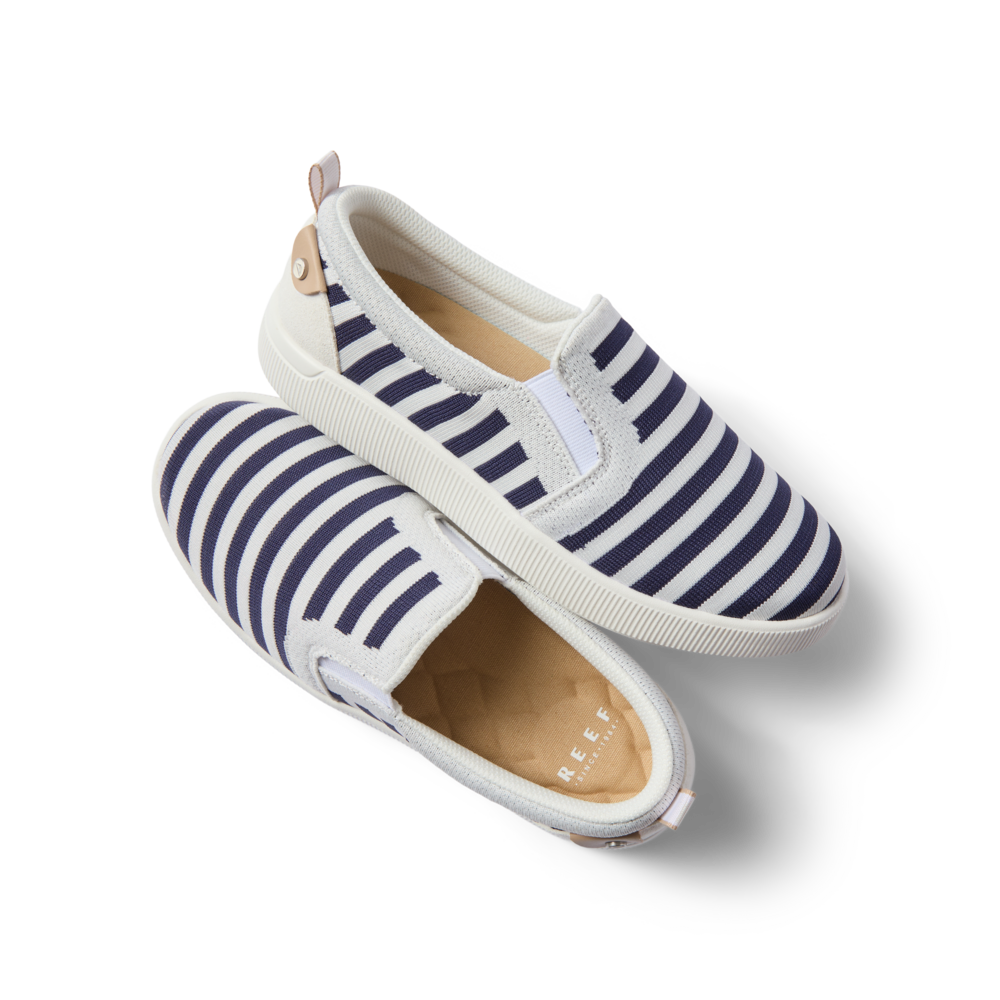 Neptune Elyse women's slip-on shoes with navy white stripes, showing top and side views, beach-inspired comfort design.