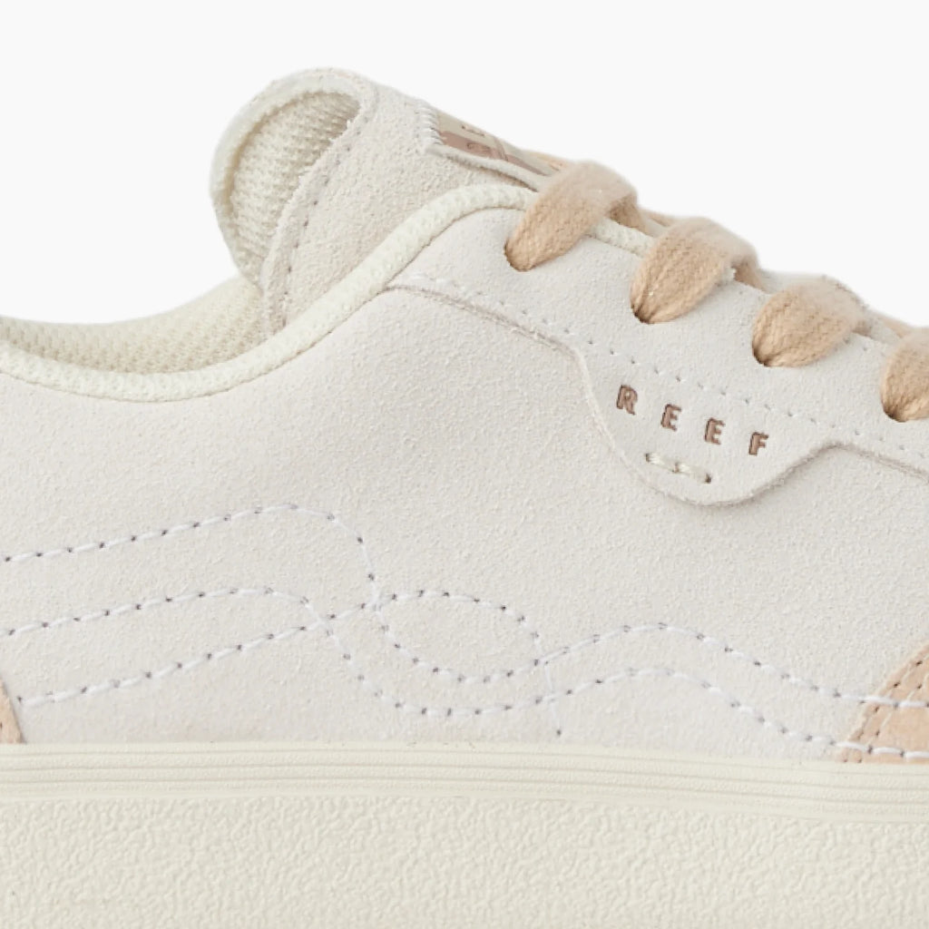 Close-up of the left side of the Boardwalk Callie sneaker showing soft-rebound cushioning and surf-inspired design.